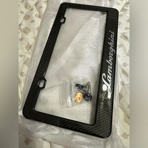 Lamborghini carbon license plate frame, and new with the hardware